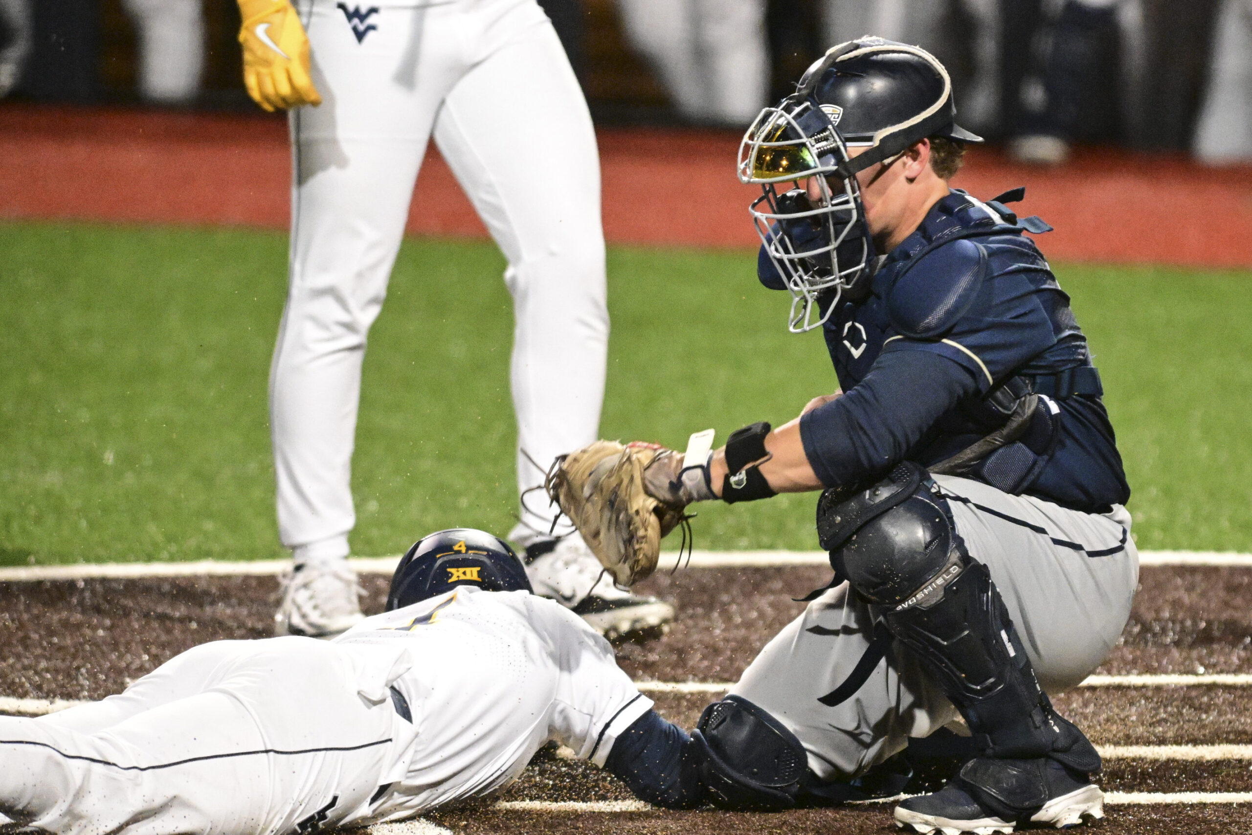 Jamison pulls off steal of home, Mountaineers top Zips after rain delay